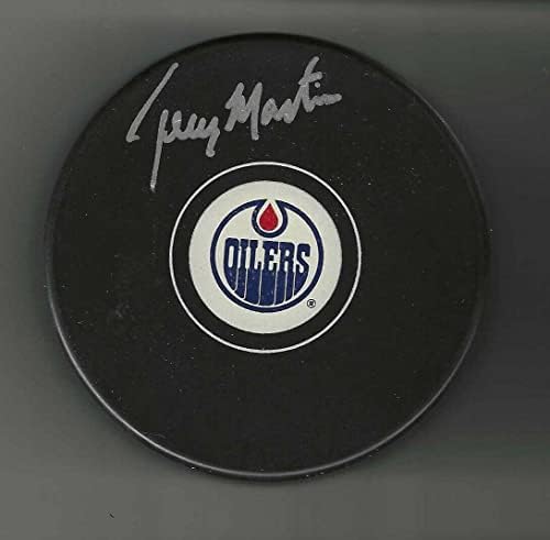 Тери Мартин подписа шайбата Едмънтън Ойлърс - за Миене на НХЛ с автограф